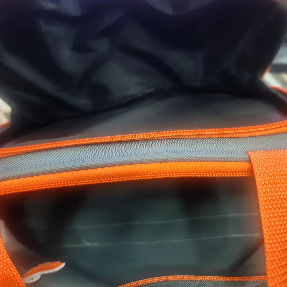 Vibrant Green and Orange Travel Bags for Adventurers